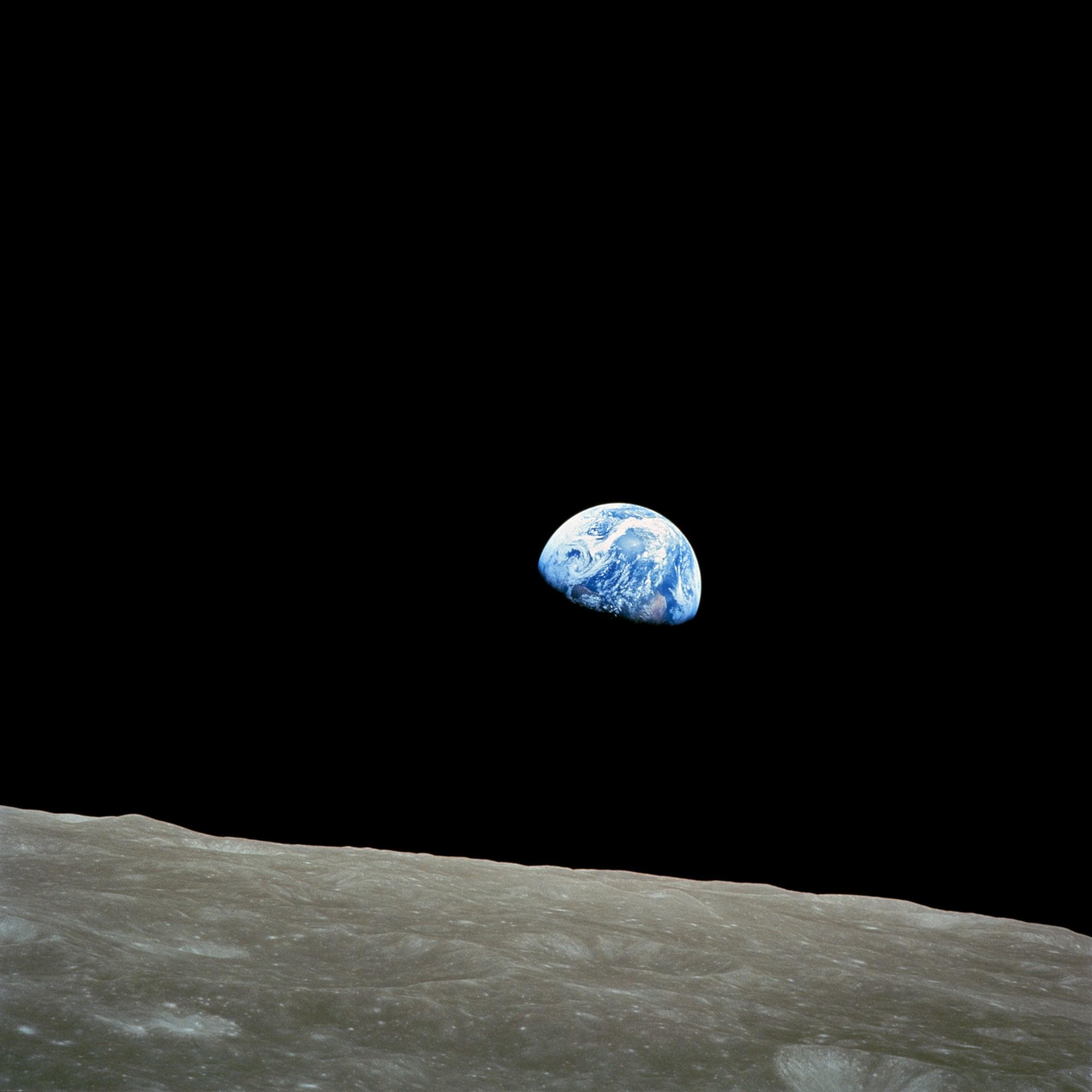 Earth rising above the lunar horizon — Earthrise by William Anders, Apollo 8, 1968